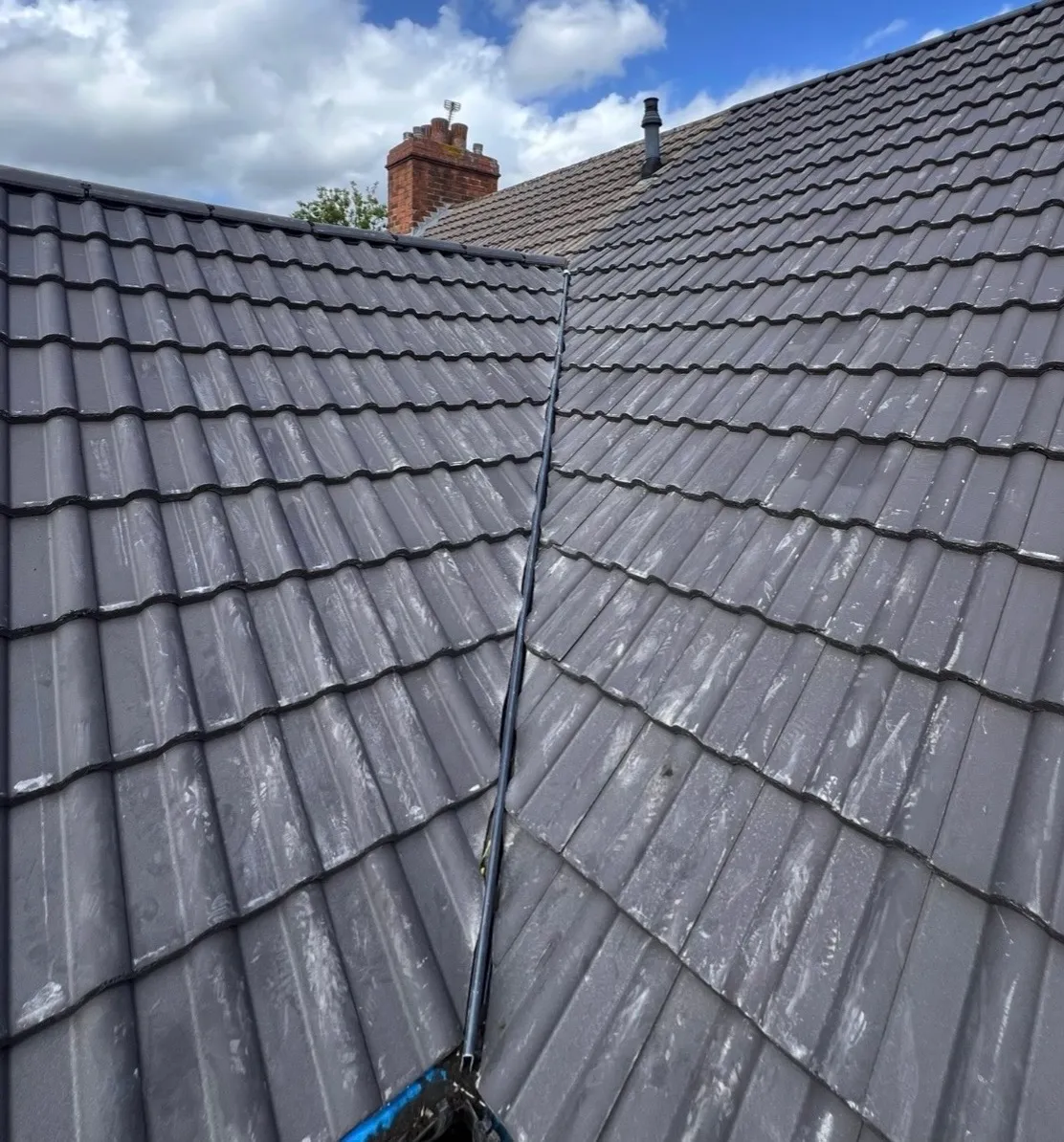Roof replacement with new ridge tiles by Coventry Roofing Group