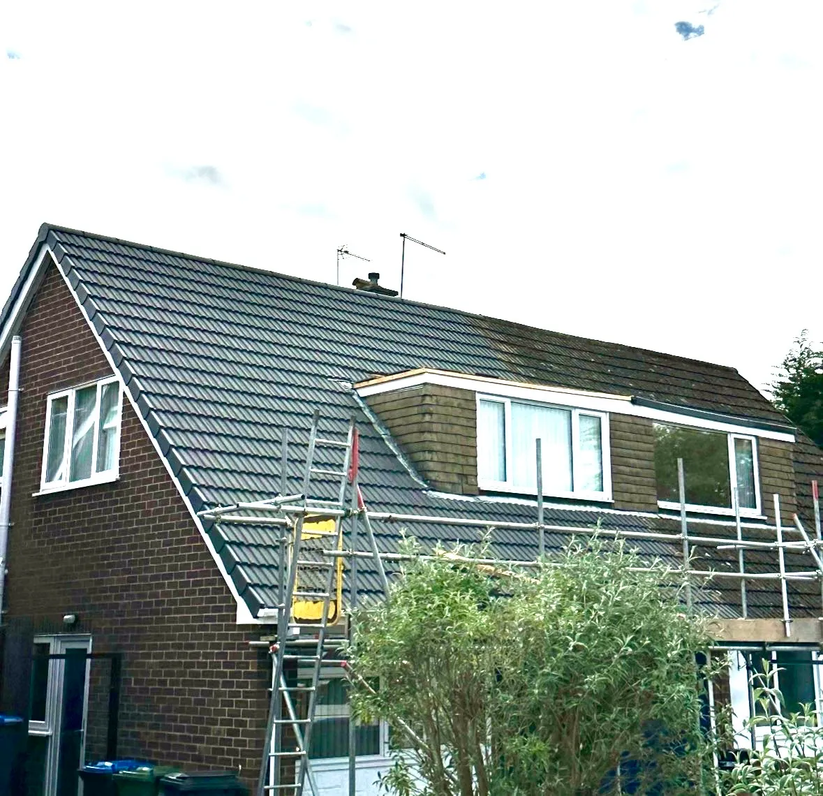 Scaffolding up for a full roof replacement by Coventry Roofing Group
